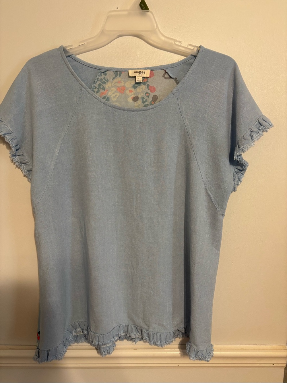 Umgee Soft Sky Blue Short Sleeve Frayed Hem Top